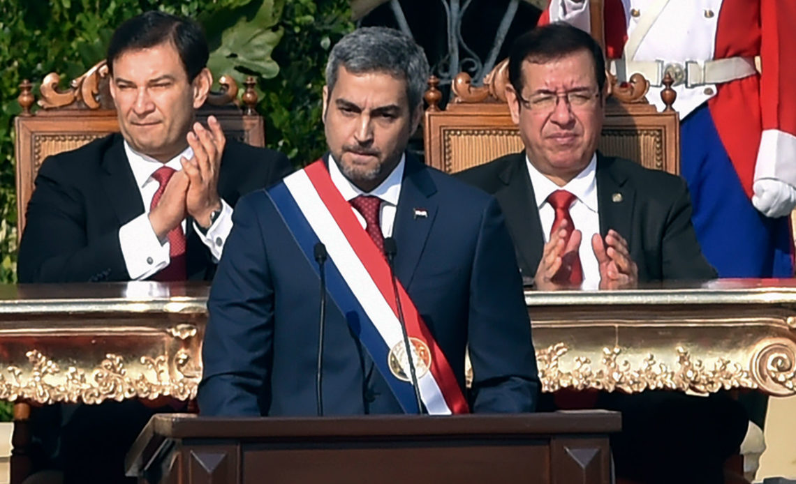 Paraguay's new President Mario Abdo Benitez (C) delivers a speech after being sworn-in, in Asuncion, on August 15, 2018. Mario Abdo Benitez, of the right-wing Colorado party, was sworn-in Wednesday as President of Paraguay, with the challege of getting to agreements with the opposition. / AFP PHOTO / NORBERTO DUARTE