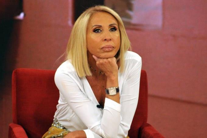 Peruvian international TV host, Laura Bozzo, listens during an interview  with The Associated Press at her home in Lima, Peru on Thursday, April 27,  2006. Bozzo said that her work with Telemundo